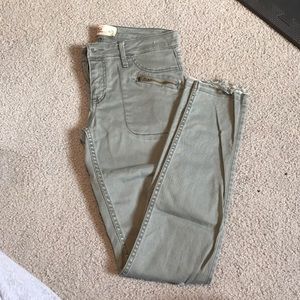 Green pants with holes